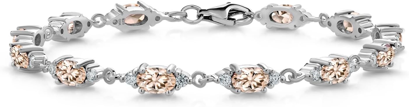 Gem Stone King 925 Sterling Silver Peach Morganite and White Moissanite Tennis Bracelet For Women (6.91 Cttw, Gemstone Birthstone, Oval 6X4MM, 6.5, 7, 7.5 Inch)