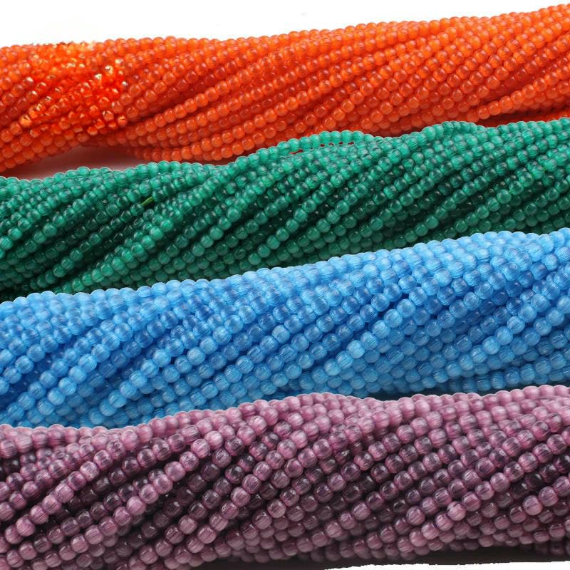 Venta al por mayor, 50 hebras/lote de cuentas redondas de cristal de ojo de gato de 2 mm, cuentas sueltas de vidrio verde para hacer joyas, pulseras y collares (4 unidades, verde claro, altura 2 mm)