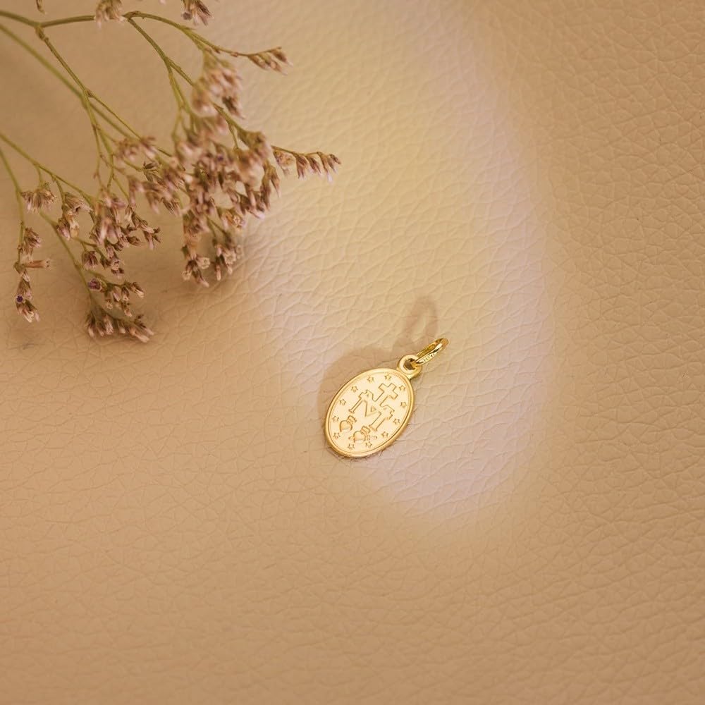 Medaglia d'oro 18k della Vergine Miracolosa ovale 14 mm.