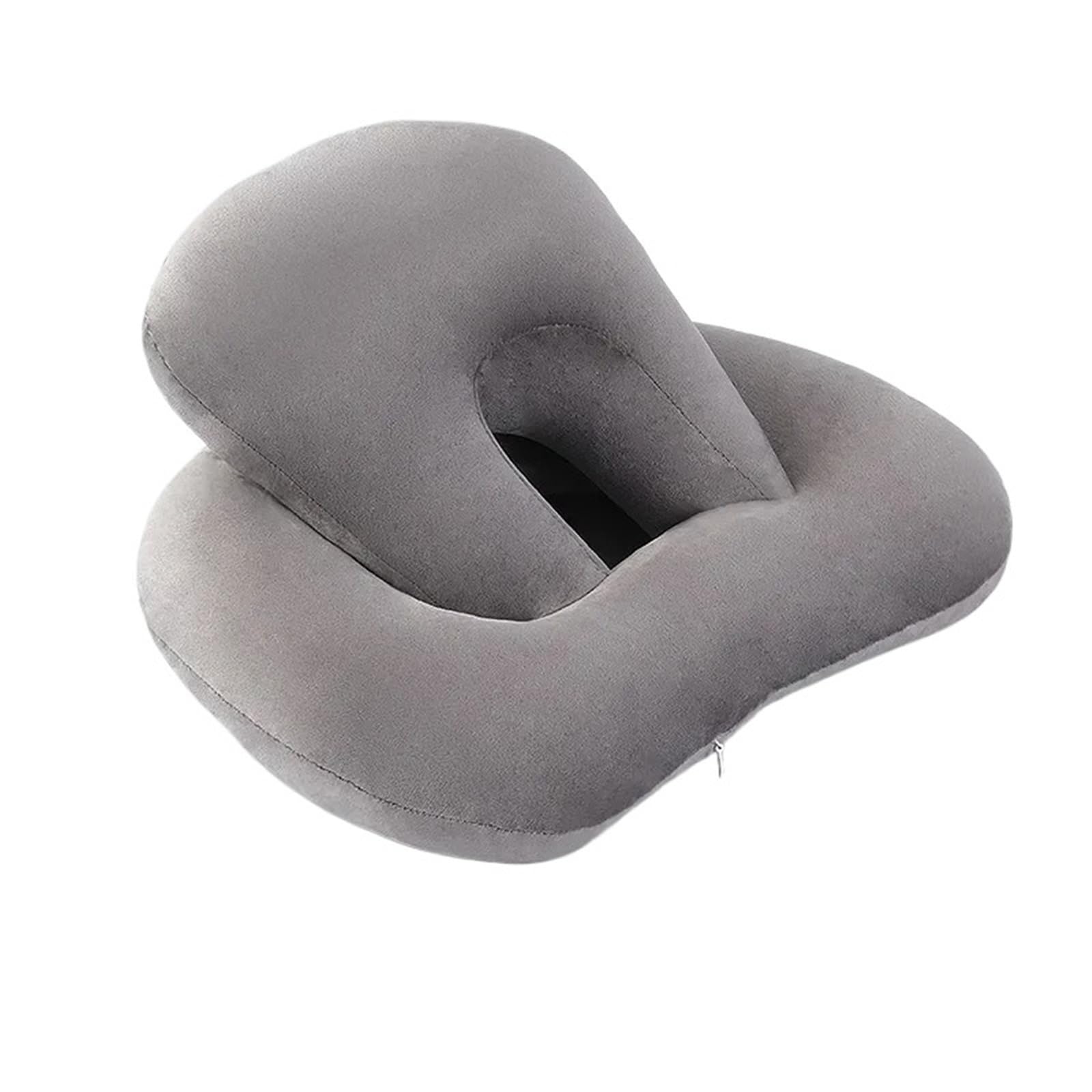Almohada para siesta hueca que evita dolores cervicales al dormir en el escritorio