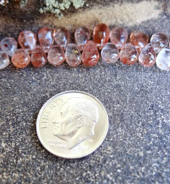 Pierre de soleil orange LKBEADS en poire lisse pour un montage de perles fluide