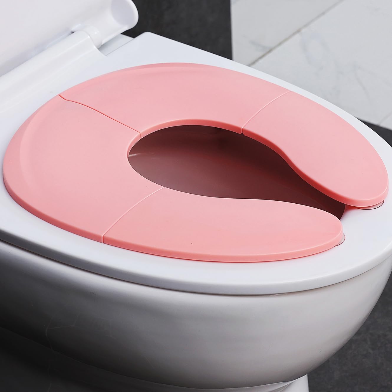 Funbliss Portable Potty Training Seat Foldable Secure Toilet Seat for Toddlers Travel Friendly Design Non Slip Suction Cups Anti Pinch Pads Fits Most Standard Toilets,Pink Toilets,Pink