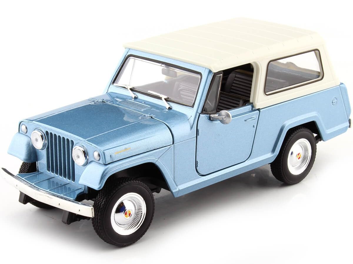 Welly 24117 – Jeep Jeepster Commando 1970 In Metallo Diecast Scala 1:24, Blu Chiaro Metallizzato, Apertura Porte E Cofano - 4