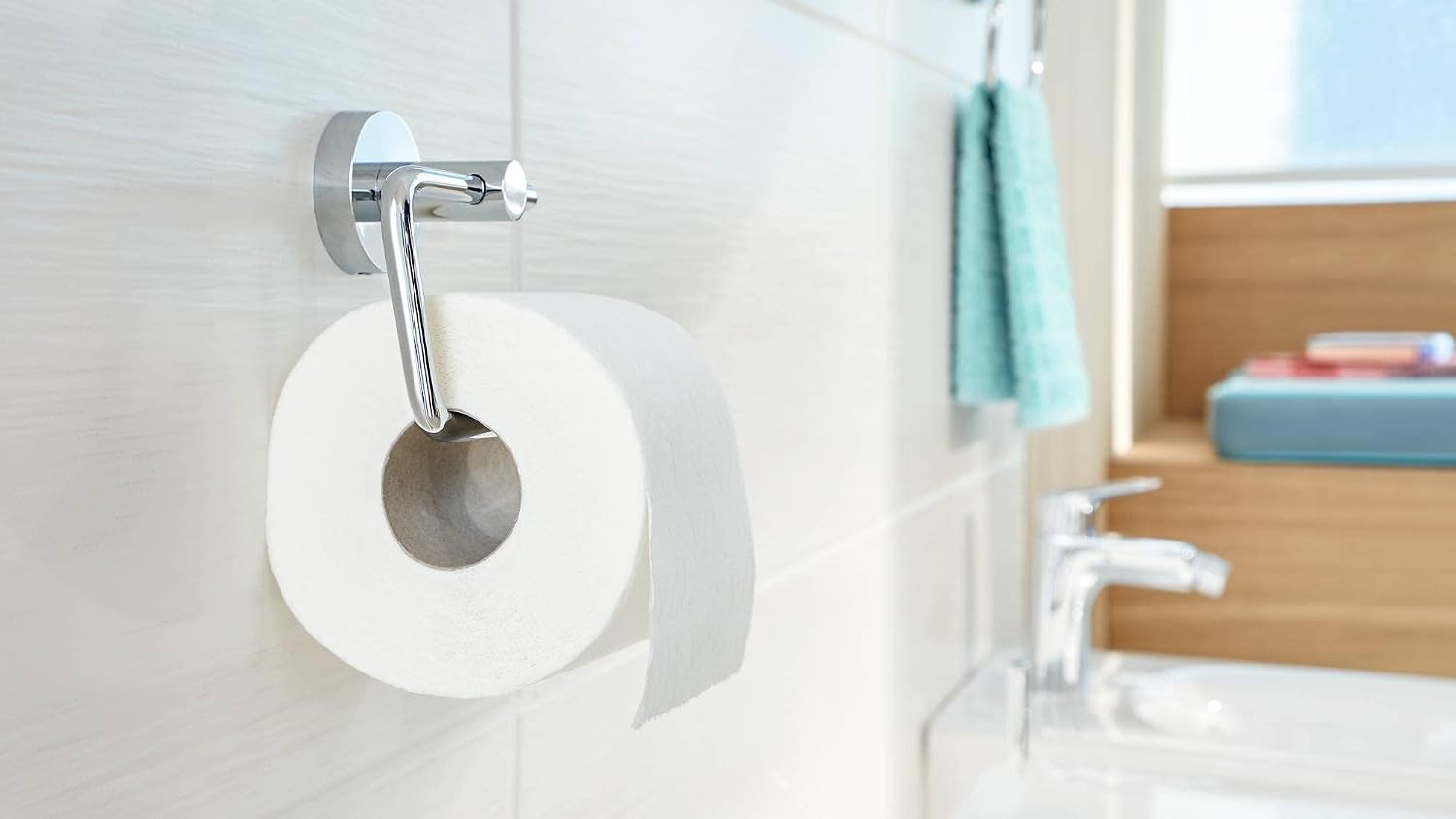 tesa SMOOZ Toilet Paper Holder - No Drill Chrome Plated Metal Toilet Roll Holder Without Lid for Bathrooms and Guest Toilets - Includes Removable Glue Solution, 53 mm x 140 mm x 99 mm