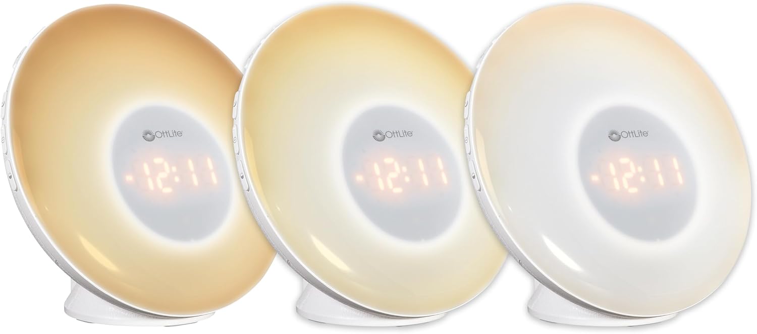 Three OttLite Wake Up Lights showing different shades of white light, from warm to cool.