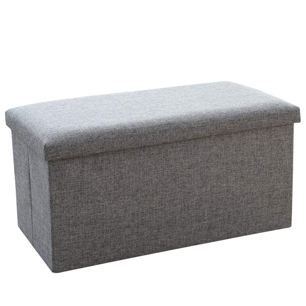 Cube pouf rembourré pour gagner de la place et ranger les plaids