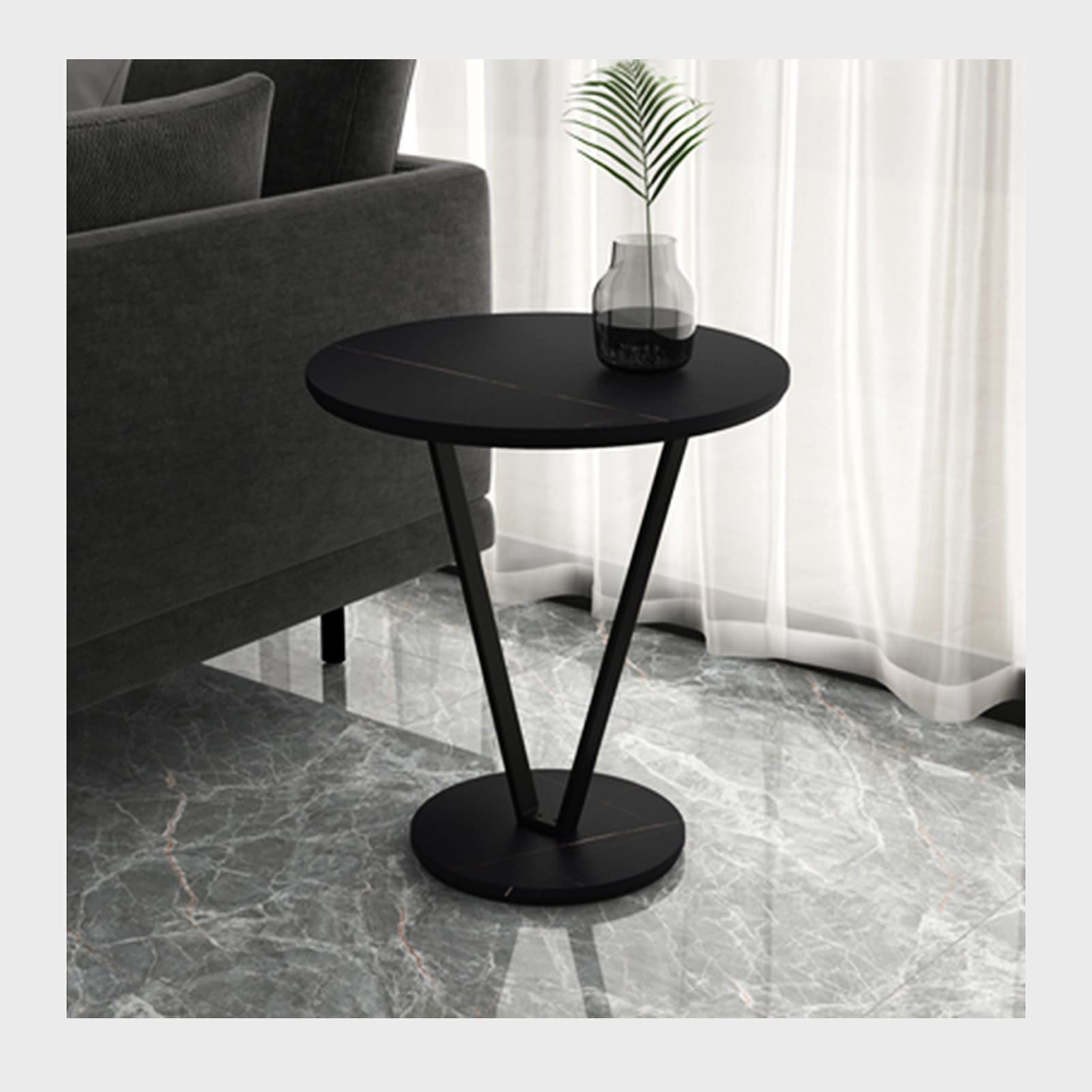 Table basse ronde en ardoise et piétement en métal au design minimaliste