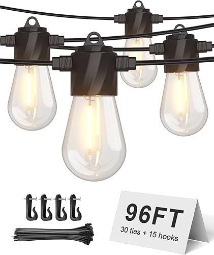 XMCOSY+ Tira de luces para exteriores de 96 pies, luces LED impermeables para patio con 32 bombillas Edison, luces colgantes regulables para
