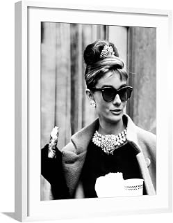 ART.COM Wall Photo Breakfast at Tiffany's, Audrey Hepburn Eating Between Scenes on Set, 1961 on White Frame, 23" x 29"