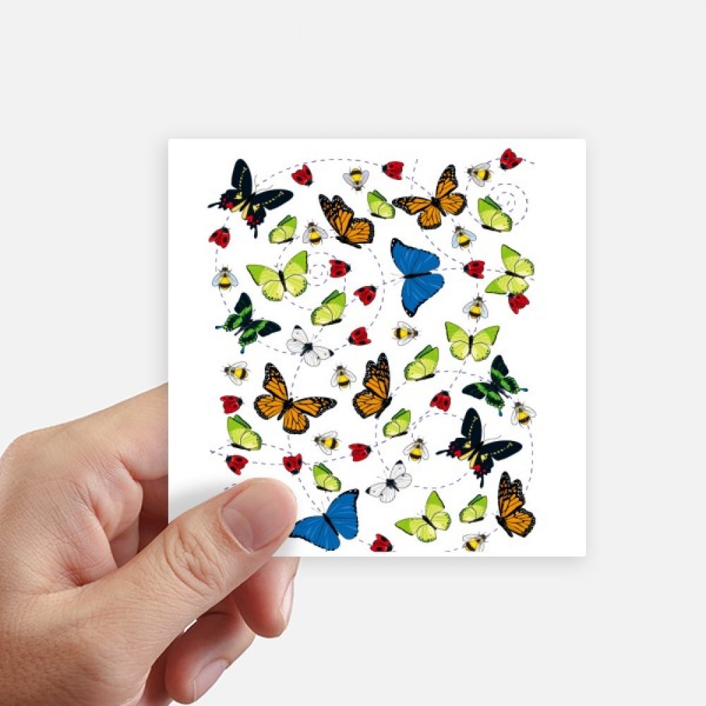 Autocollants papillon volant 10cm de style carré pour déco murale et pc portable