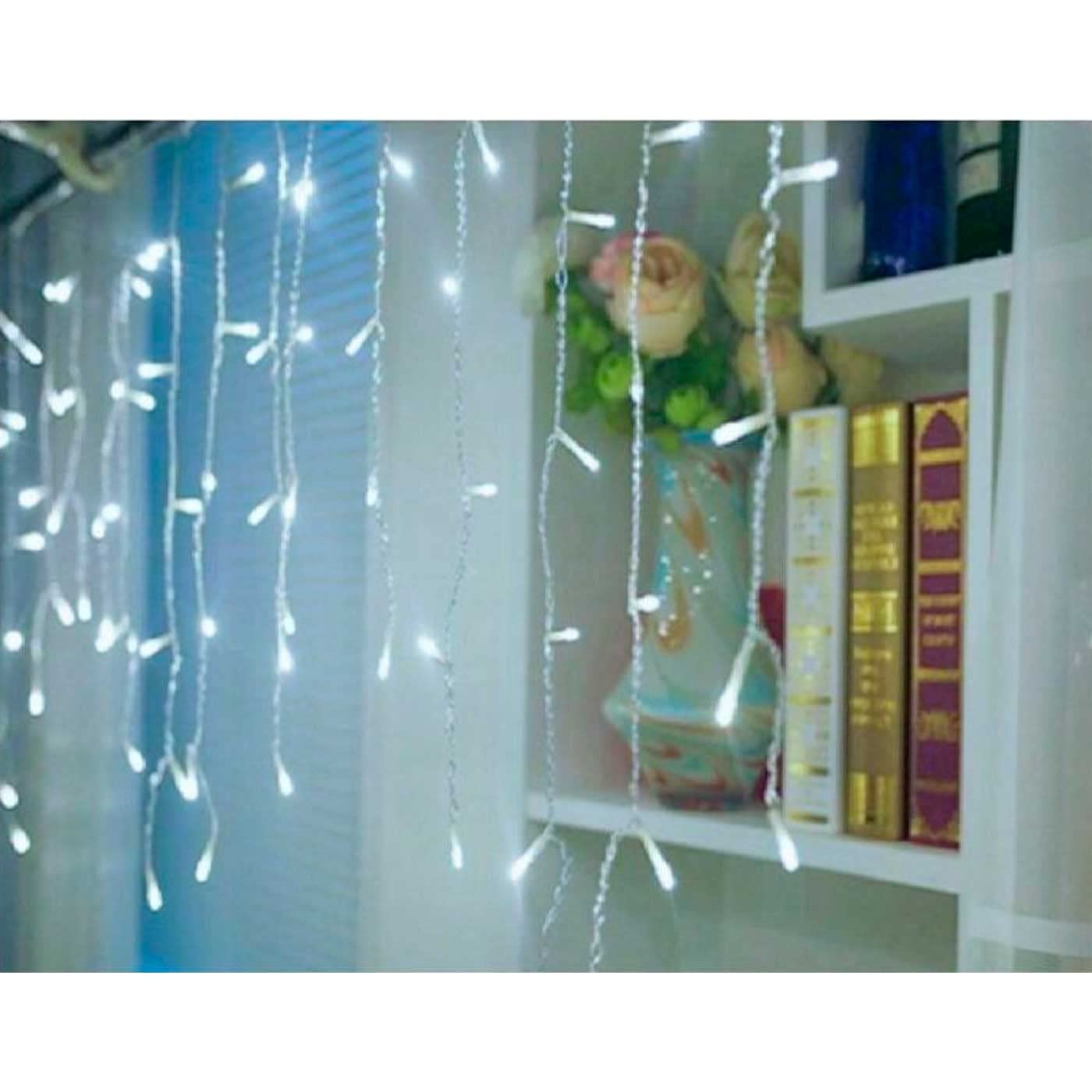 Tradineur - Cortina de 144 luces LEDs a pilas - Apto para interiores y exteriores - Función de luz foja e intermitente - Color Blanco