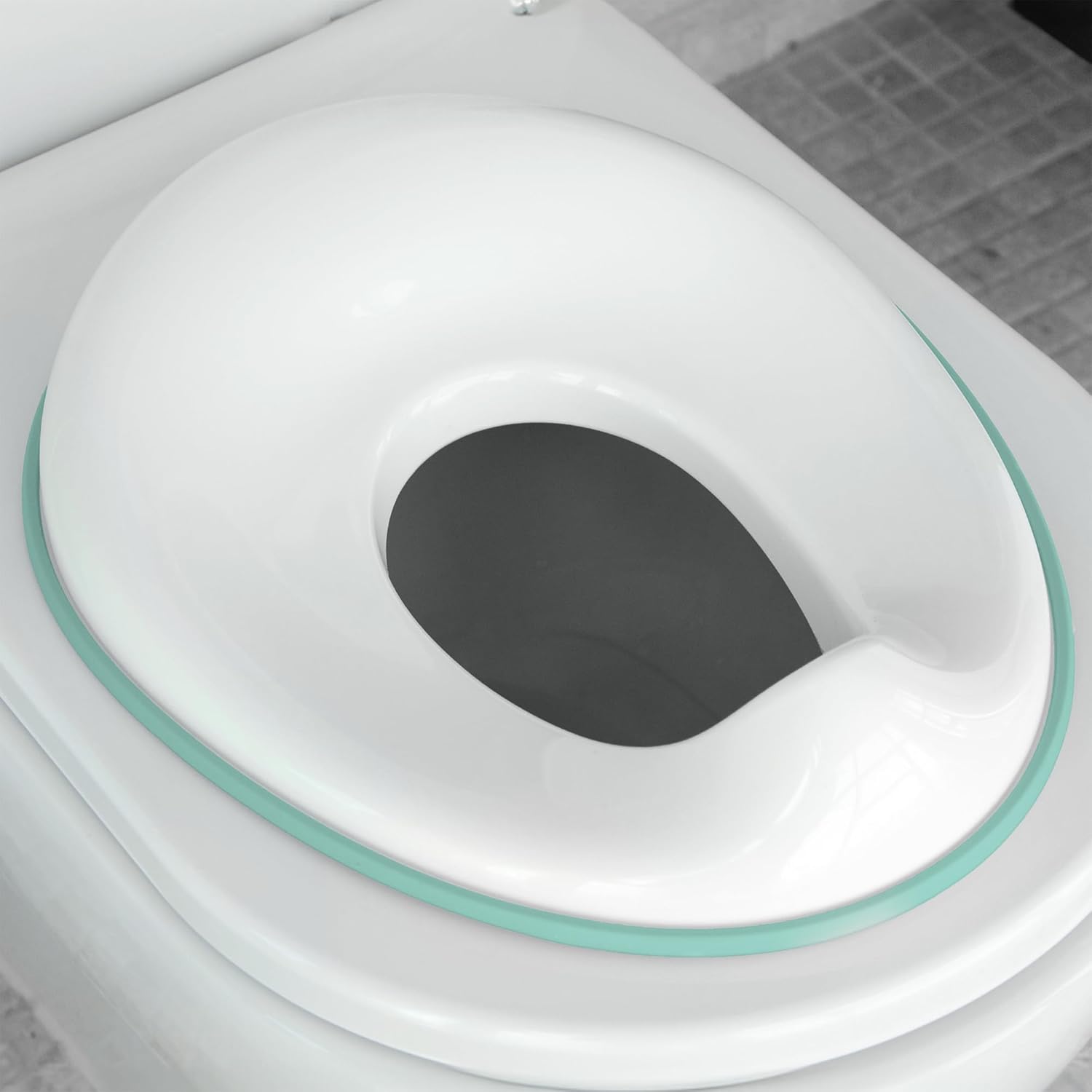Product image of Jool Baby Potty Training Seat for Boys And Girls, Fits Round & Oval Toilets, Non-Slip with Splash Guard, Includes Free Storage Hook (Aqua)