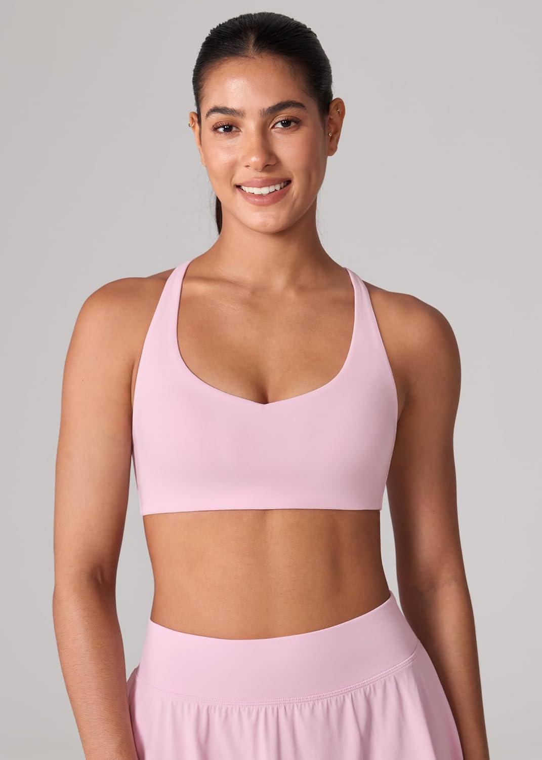 UNISSU Hugcurve Adjustable Twist Cross Back Sports Bra for Women V Neck Wireless Padded Yoga Workout Tops