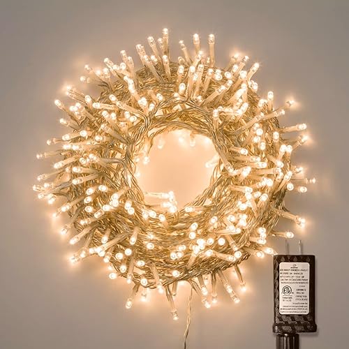 Gresonic Tira de 100 luces LED de 33 pies para interiores y exteriores, luces de Navidad blancas cálidas, alambre transparente, 8 modos de