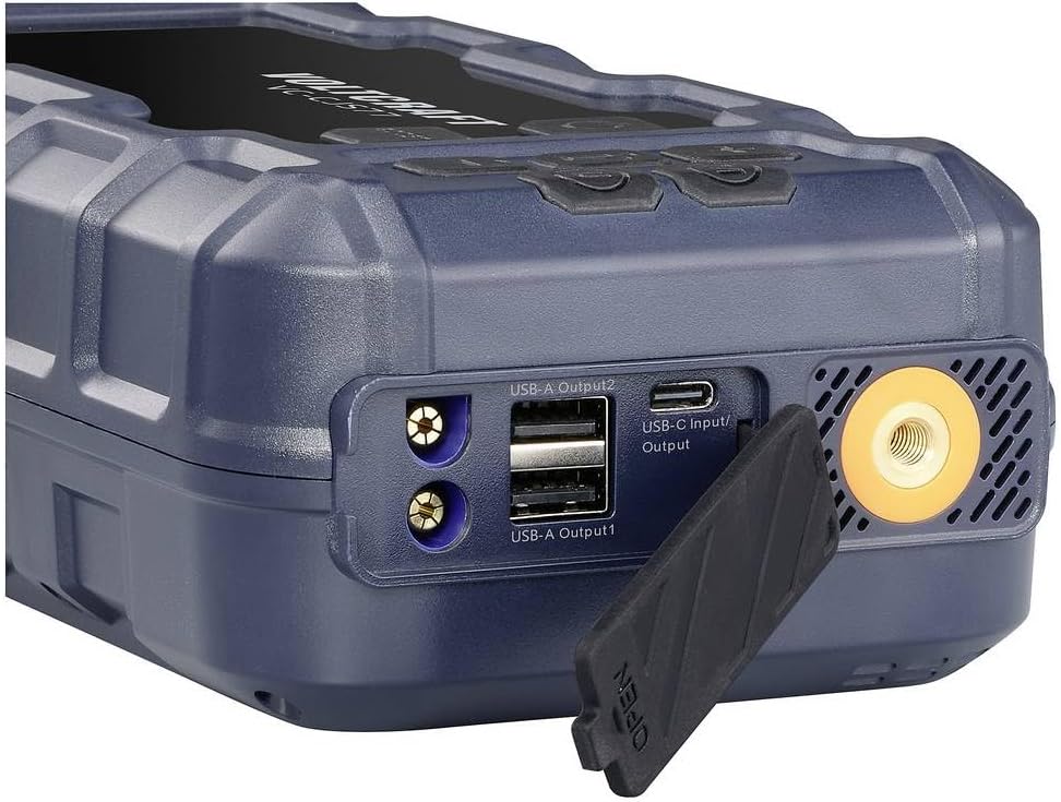sebelah view of the Voltcraft VC-CJS77 Jump Starter showing USB-A output ports, USB-C input/output port, and the jump starter connection port.