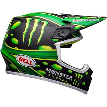 green and black dirt bike helmet