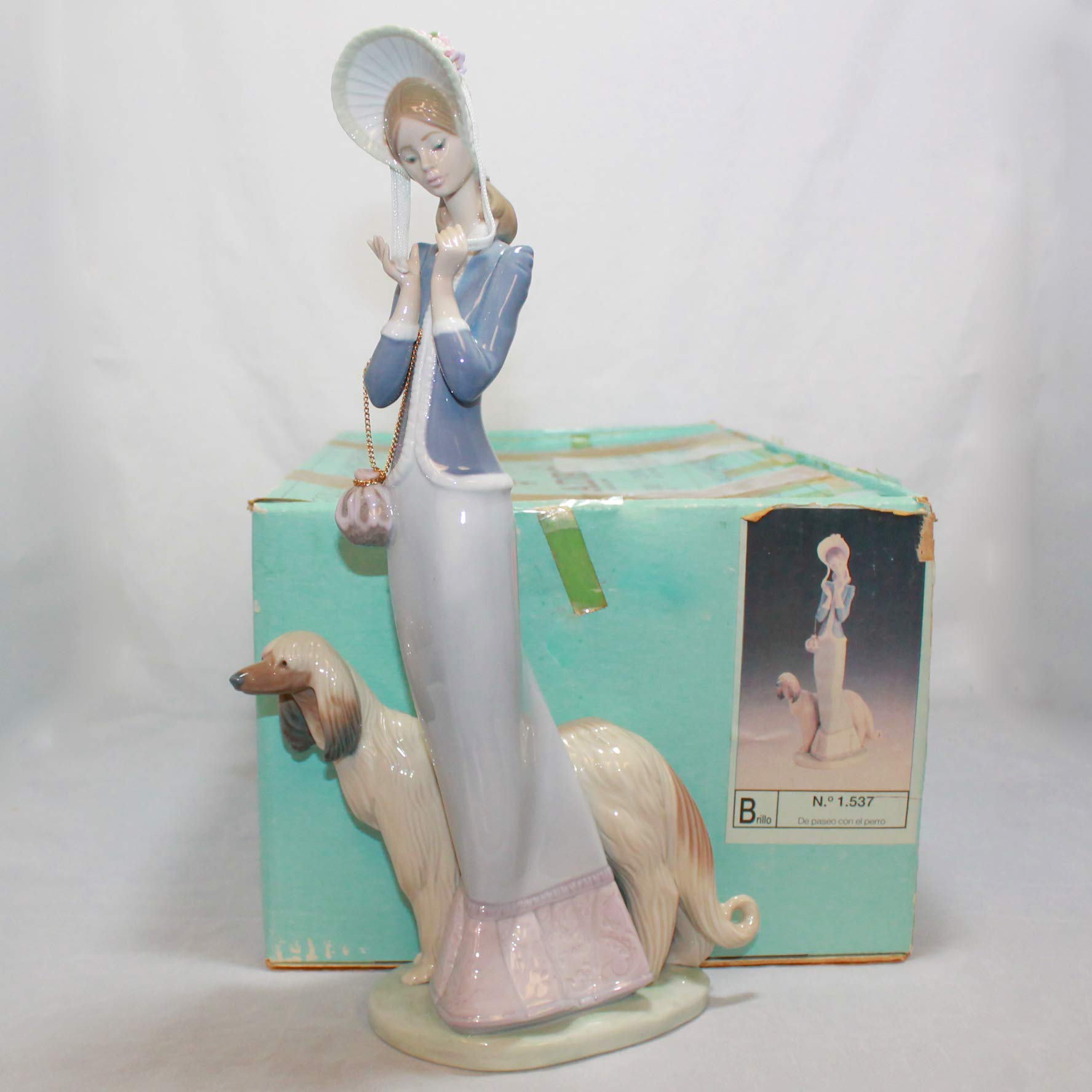 Amazon.com: Lladro Figurine 1537 Stepping Out : Home & Kitchen