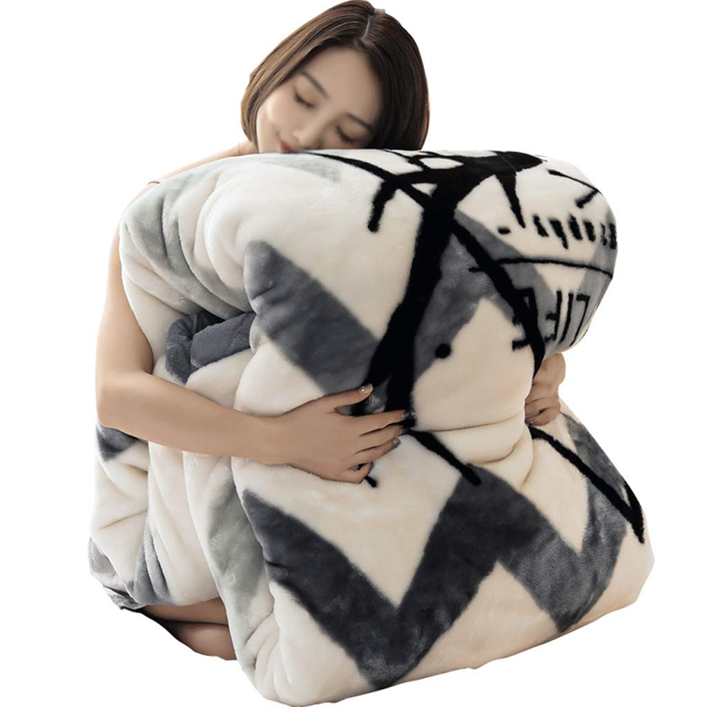 Couverture flanelle Sherpa 200x230cm : finis les pieds froids sur le canapé