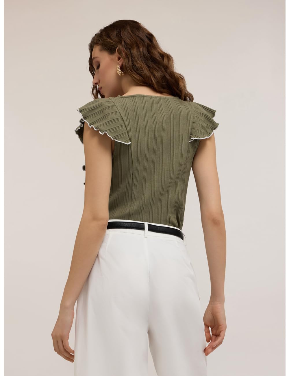 Motivi: Maglia a Coste con Rouches Stagione Primavera Estate 2025.