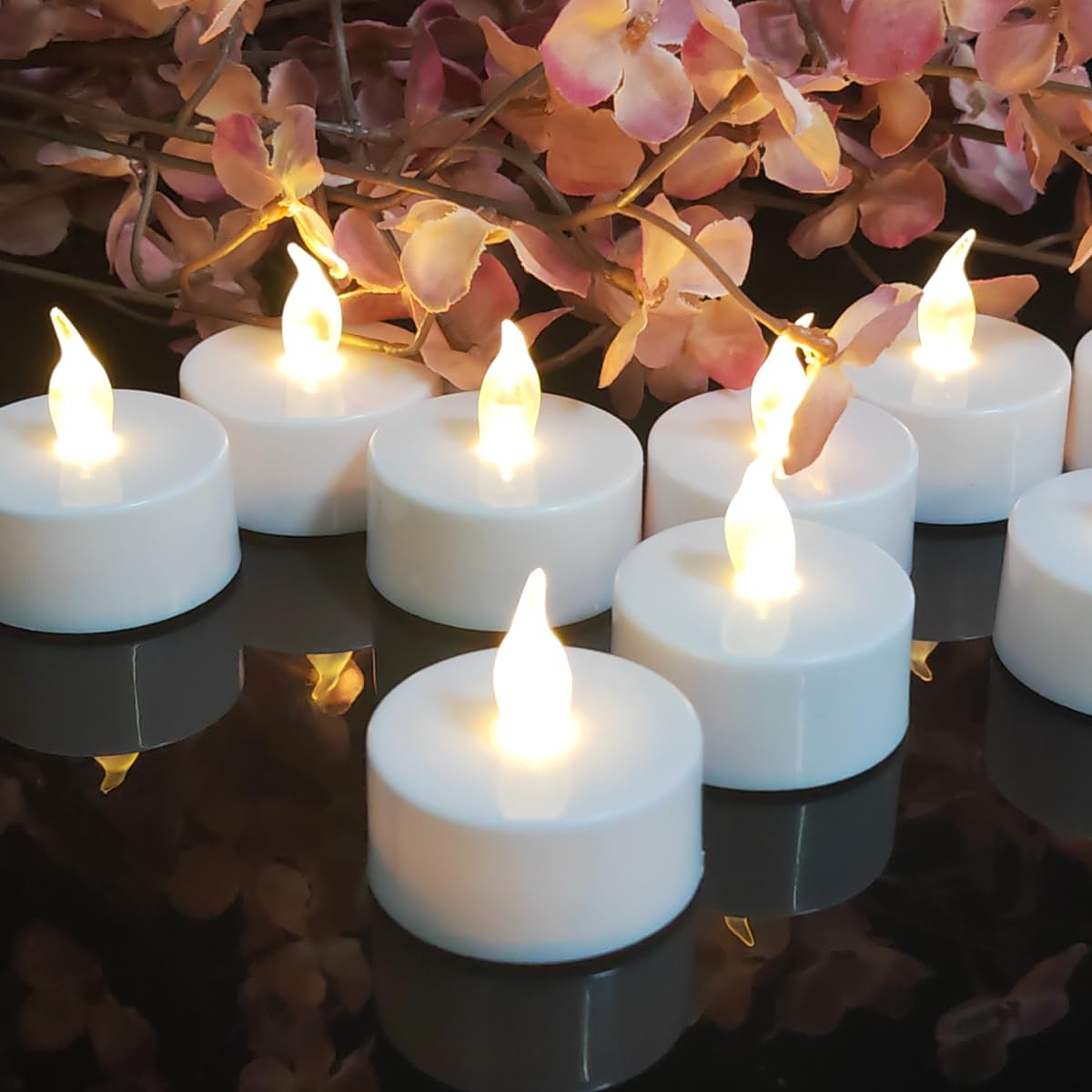 Jialine LED Tea Lights Pack of 12 Flameless Electric Candles, Extra Long Battery Life 200+ Hours for Christmas, Wedding, Party