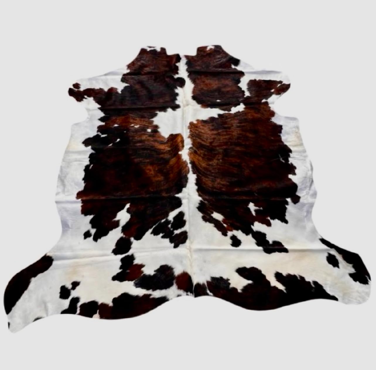Tapis en peau de vache naturelle marbré marron et blanc d'exception pour salon