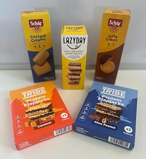 *BRITSH GOODS* GLUTEN FREE Snack Pack/Gift/Hamper *Vegan/Vegetarian* 1 x TRIBE Chocolate Peanut Protein Flapjack (3x38g Ve) 1 x TRIBE Caramel Protein Flapjack (3x38g Ve) 1 x LAZYDAY Millionaires Shortbread, 1 x Schar Custard Creams (Ve125g), 1 x Schar Jaffa Cakes (Vegetarian - 150g) Delicious Gluten Free snacks, care package, hamper, gift for adults & kids *Imported from UK/Britain/England*