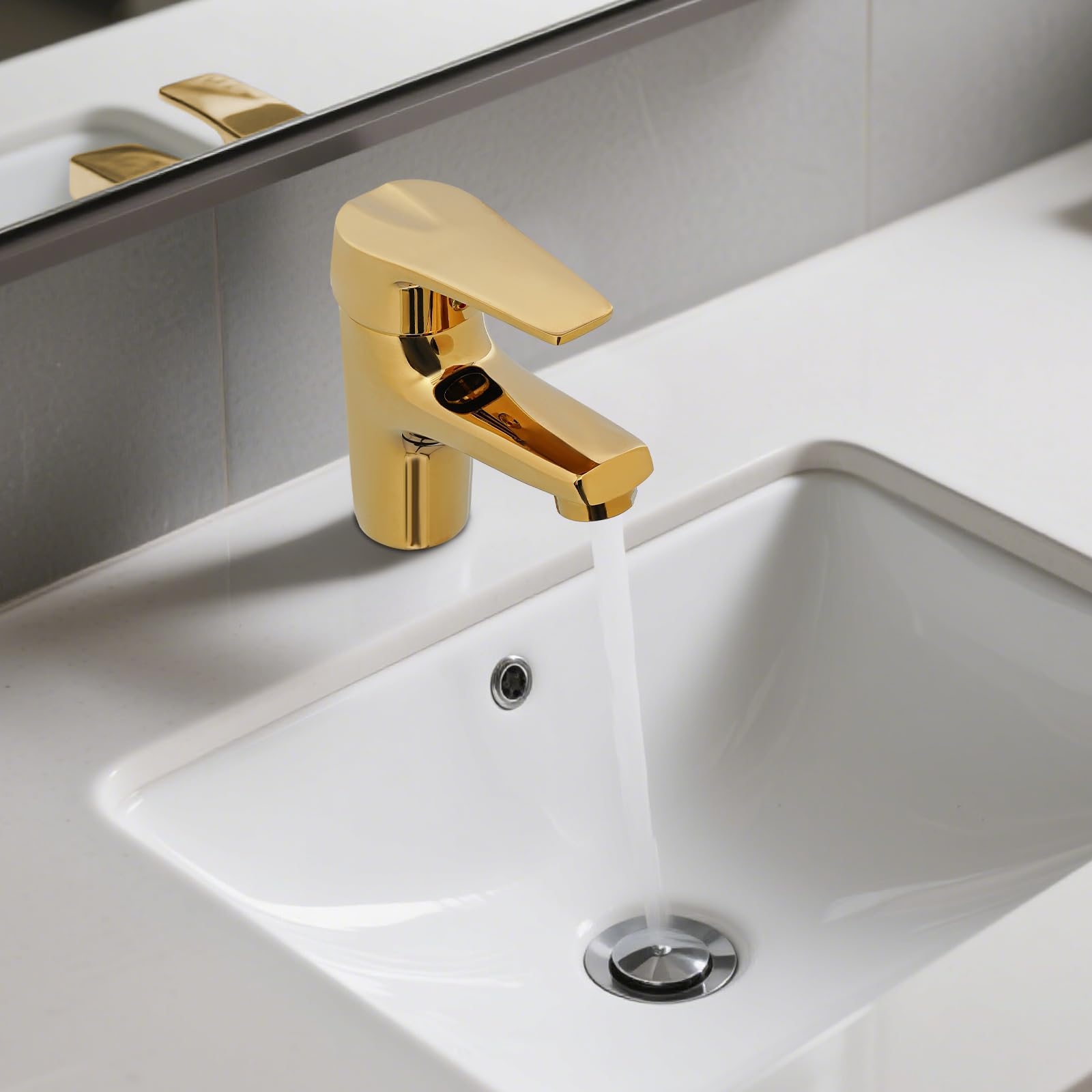Grifo de lavabo de latón con orificio dorado
