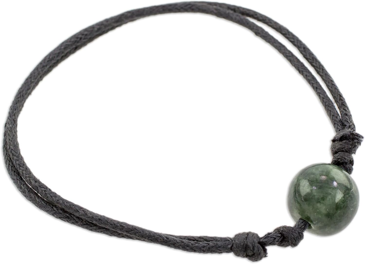 NOVICA Artisan Handmade Jade Pendant Bracelet Adjustable Dark Green from Guatemala Cotton Cord [5.5 in min L x 10 in max L x 0.4 in W 2 mm W Pendant(s) 10 mm W] ' Simplelife in Dark Green'