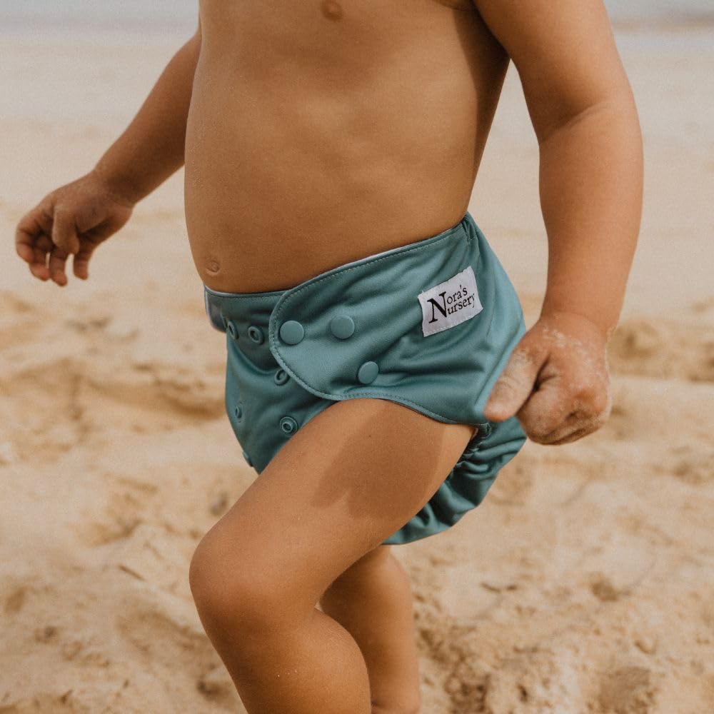 Nora's Nursery Paquete de 7 pañales de tela con 7 insertos y 1 bolsa húmeda, funda impermeable, lavables, reutilizables y pañales de bolsillo ajustables de talla única para recién nacidos y niños