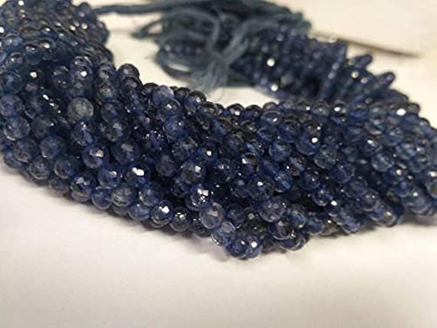 Perles iolite rondes facettées 4mm pour fabrication de collier en pierre bleue