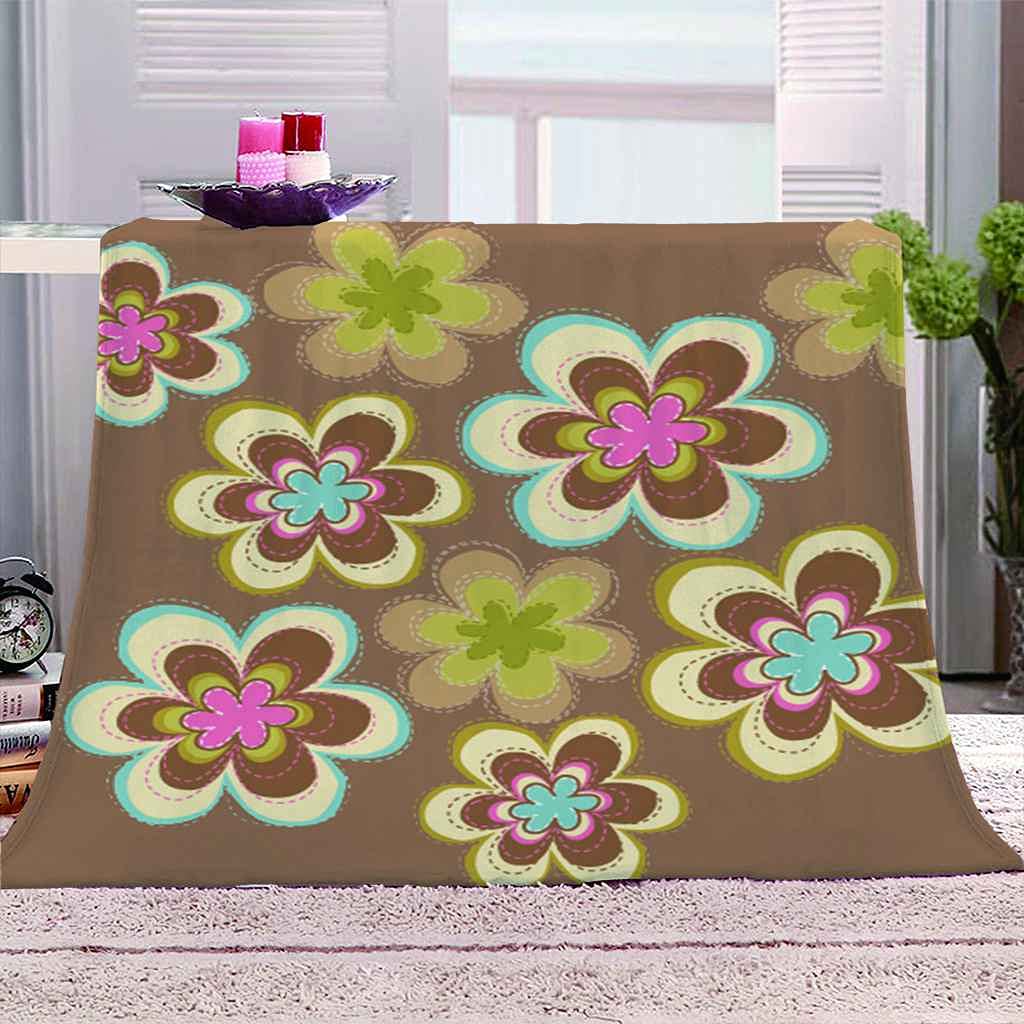 Couverture polaire florale pour cocooning et soirées sur le canapé