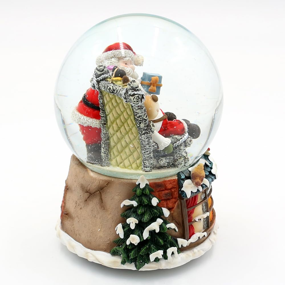Schneekugel Rentier im Sessel und Weihnachtsmann, auf Kamin Sockel, mit Spielwerk, Melodie: Here Comes Santa Claus, L/B/H/Ø Kugel 11 x 11 x 15 cm Ø 10 cm.