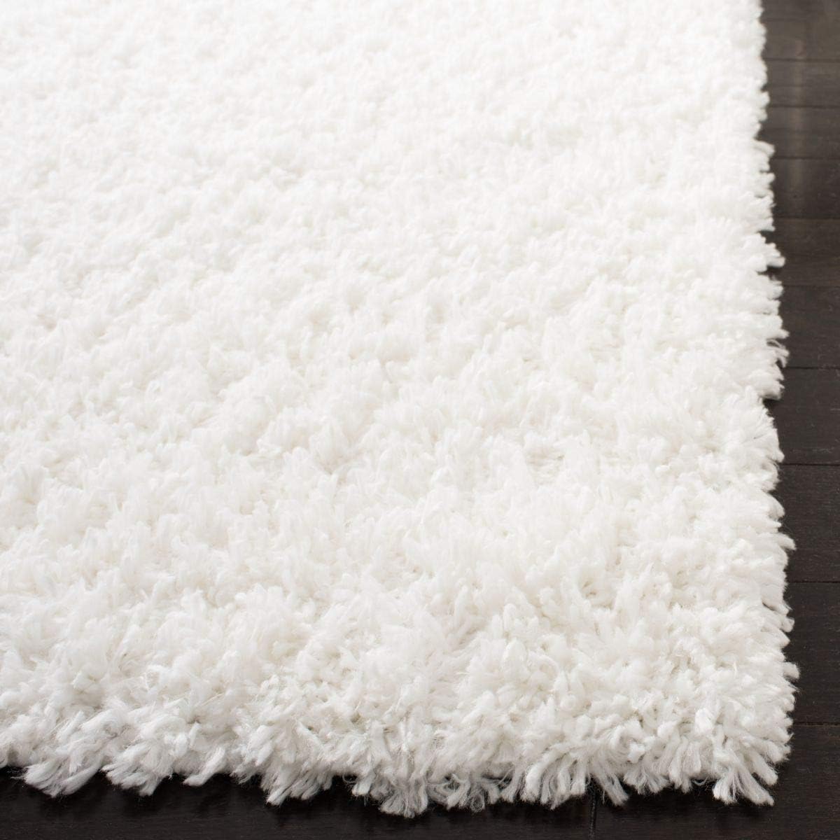 August Shag White Synthetic Area Rug 2' x 5'