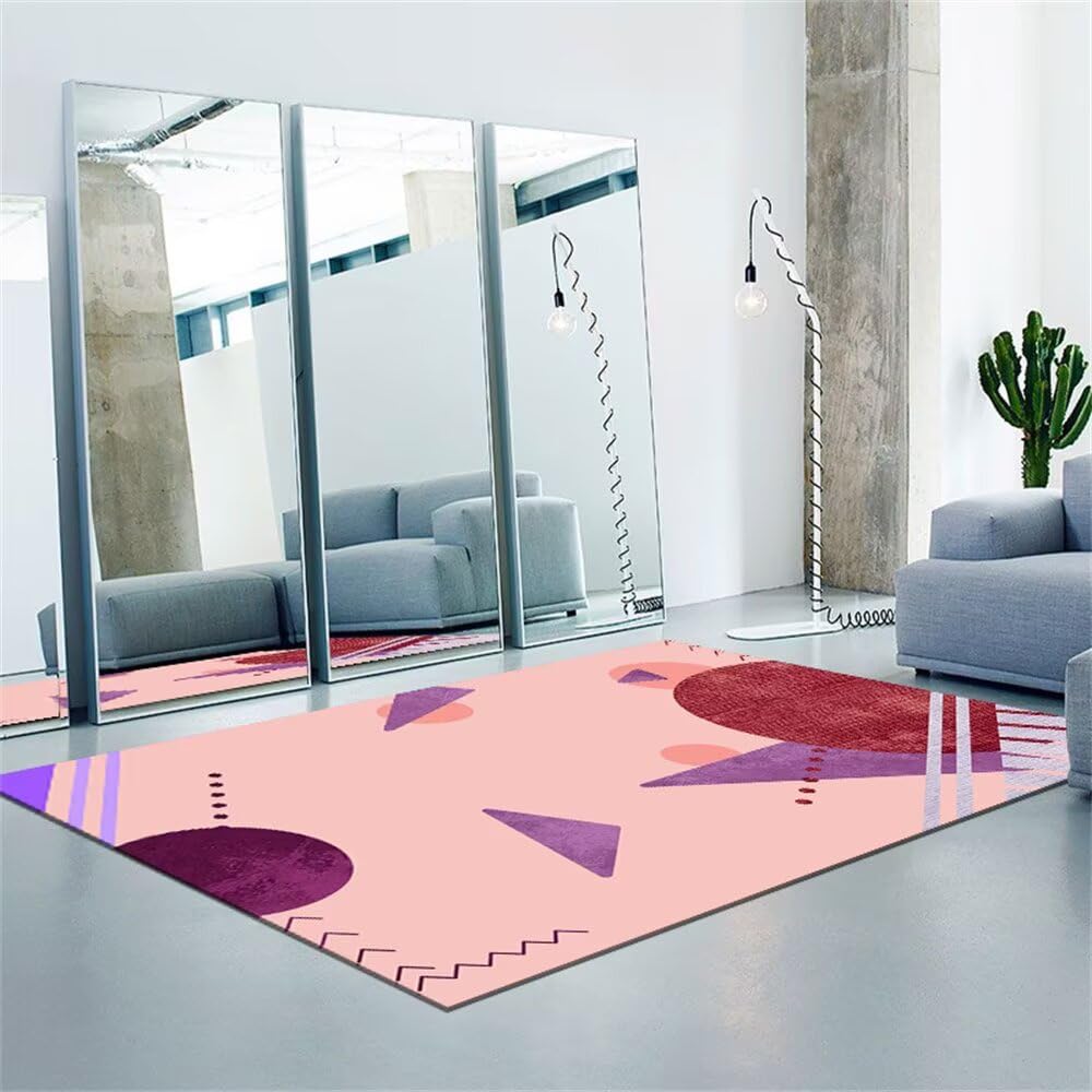 Tapis de salon tout doux rose et violet pour réchauffer l'ambiance sous votre table basse