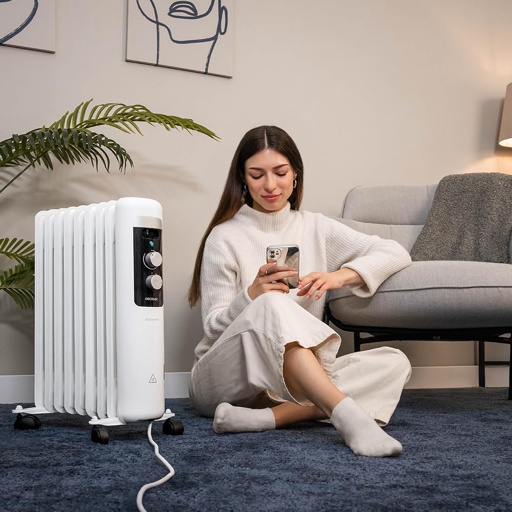 Cecotec Radiador Eléctrico de Aceite Bajo Consumo de 9 Módulos ReadyWarm 950 Space White. 2000W, 3 Niveles de Potencia, Sistema de seguridad y Ruedas, Ideal para 20m², Blanco