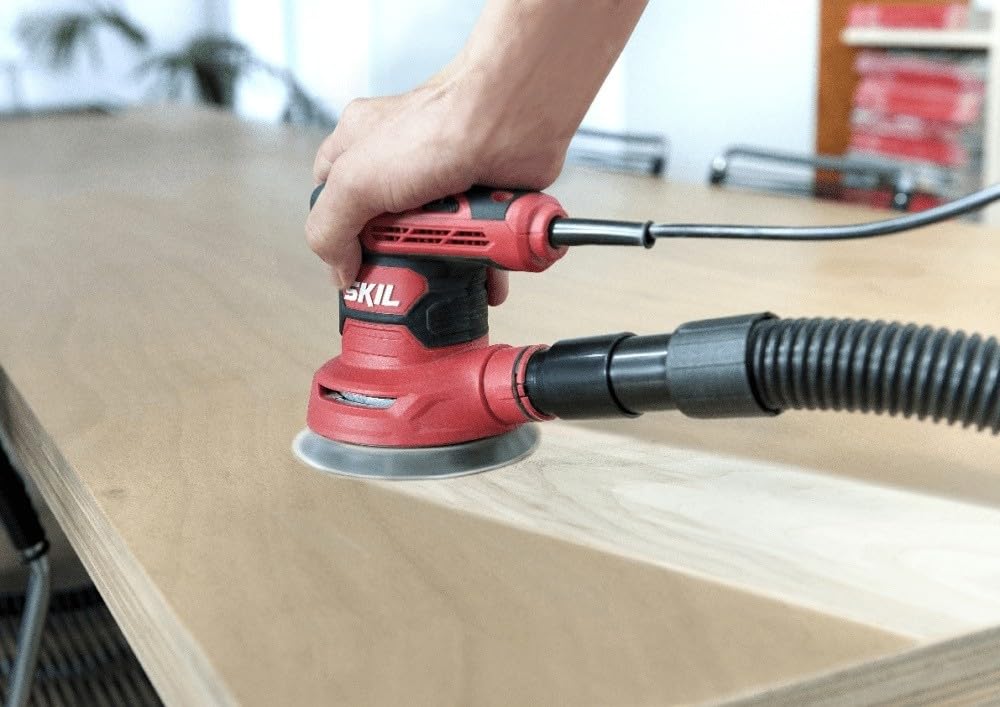 SKIL 7471AA - Smerigliatrice orbitale da 125 mm (300 W, sistema di bilanciamento VRS, funzionamento con una sola mano, funzione di controllo della velocità, sistema di raccolta della polvere "X-Flow