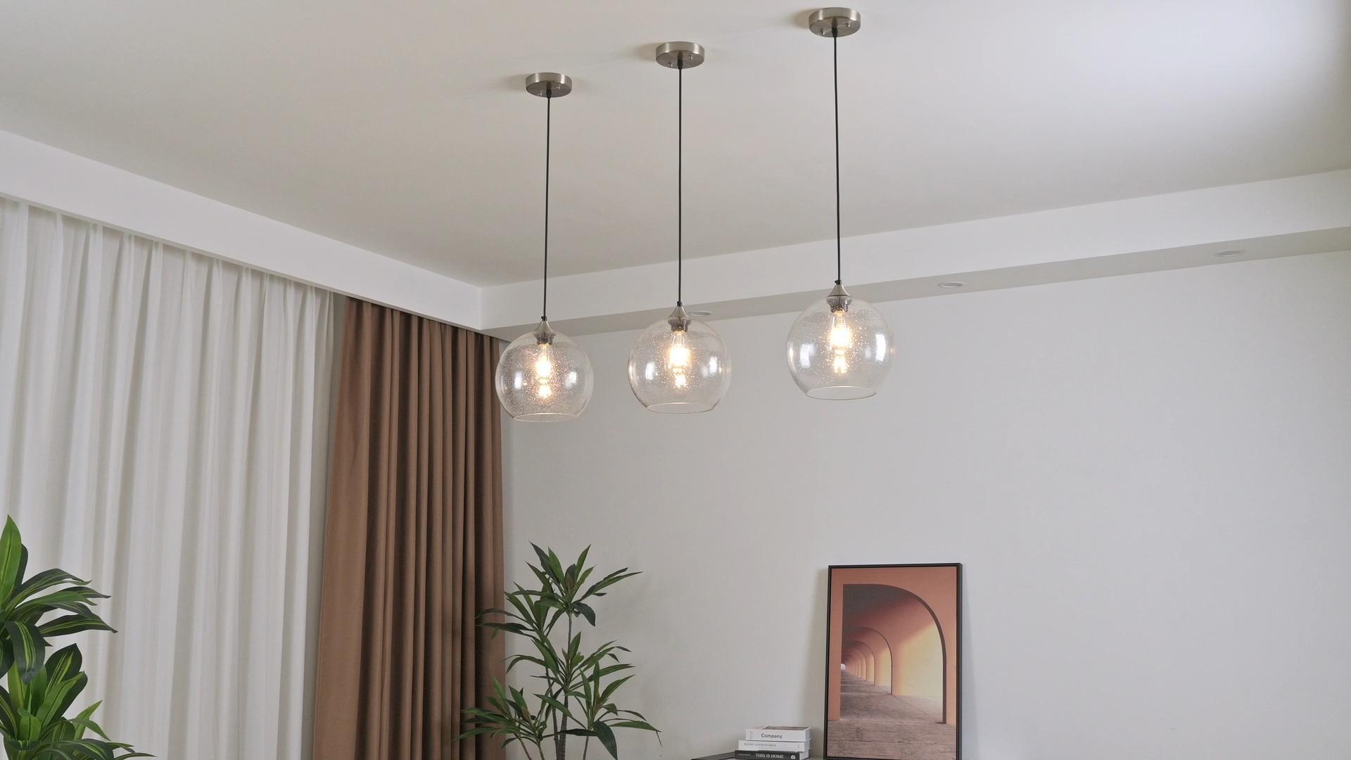 Image of Clear Glass Pendant Lights Kitchen Island Lighting Globe Pendant Light Fixtures Modern Pendant Lighting for Kitchen Island Bedroom Living Dining Room Light Fixture(9.84in, 3-Pack)