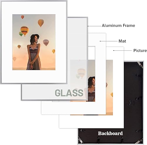 Vista 250 de Frametory - Marco de aluminio de 11 x 14 para fotos de 8 x 10 (en pulgadas), con paspartú marfil, de pared, con gancho de sierra, pestañas Bronce