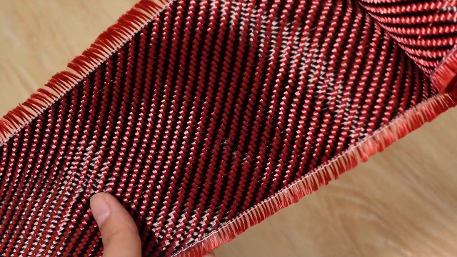 Image of Jecery 9.84 ft x 4 Inches Red Aramid Carbon Fiber Fabric Sheet 2x2 Twill Weave 3k / 200g Pure Synthetic Carbon Fiber Cloth Roll for Structural Reinforcement on Concrete Walls, Basements, Boats