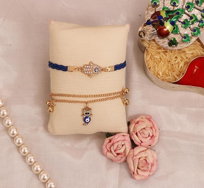 Image of Chocozone Evil Eye Rakhi for Brother & Bhabhi Rakhi Lumba Set for Bhai Bhabhi Rakhi Gifts for Bhai with Roli Chawal & Card Rakshabandhan Gifts for Brother