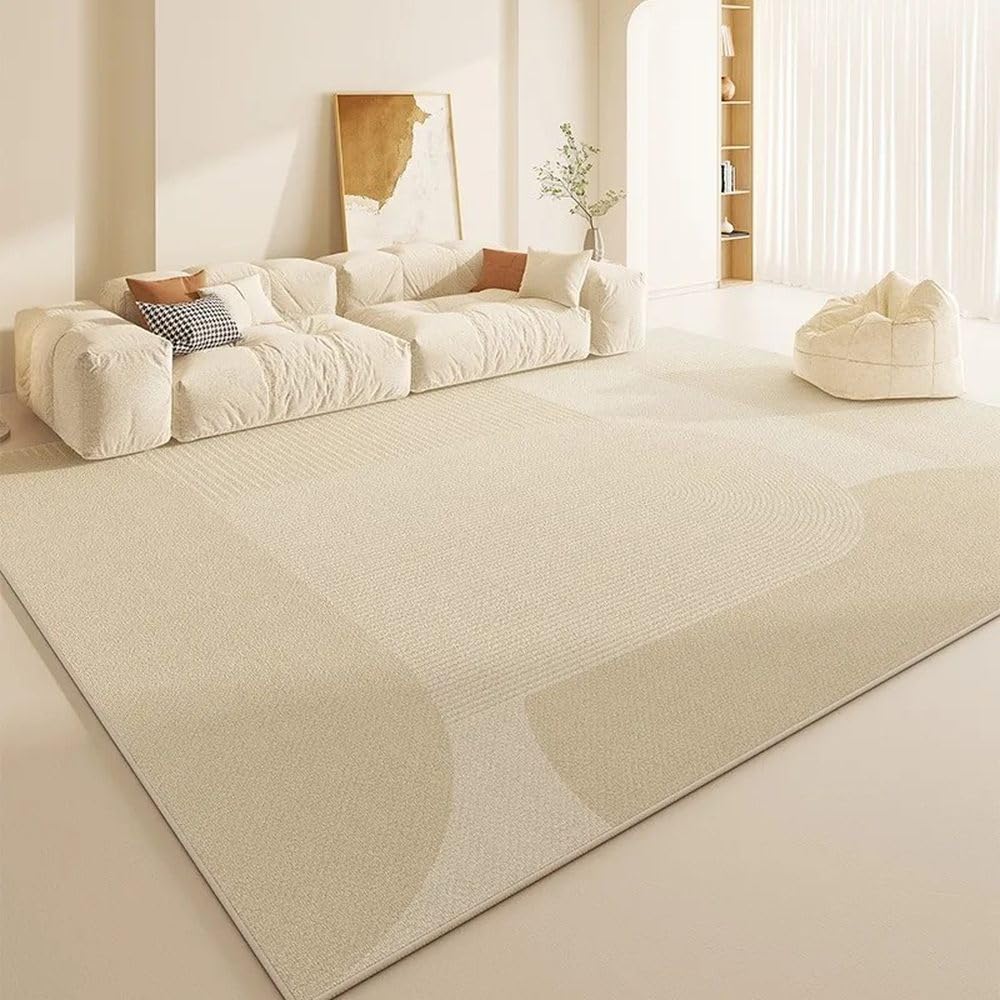 Tapis de salon beige idéal sous une table basse pour créer un coin lecture cosy