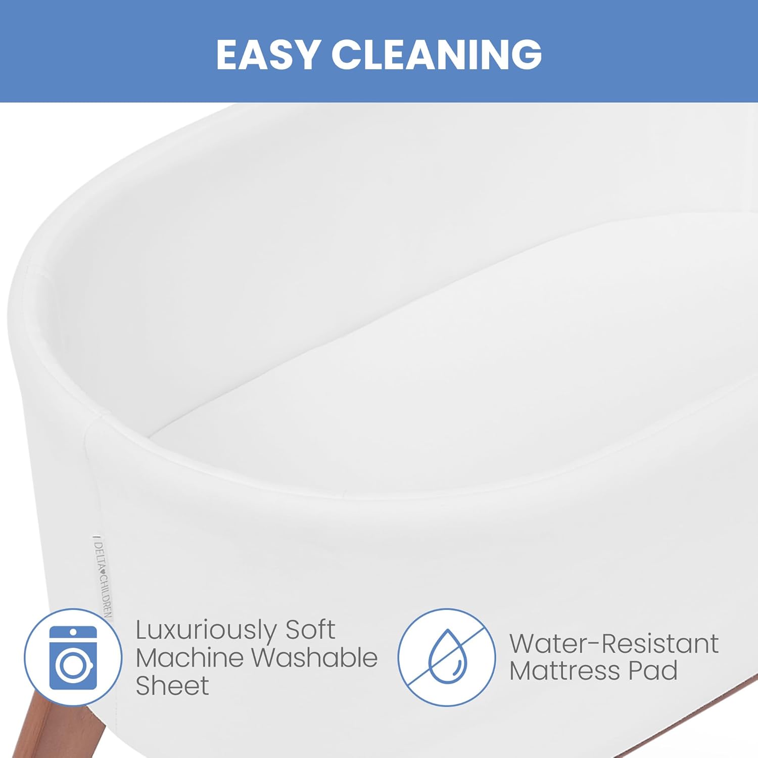 Delta Children Aero Bassinet - Portable Baby Crib with Solid Wood Legs, Organic GOTS Certified Performance Fabric Exterior, Breathable Interior, Includes Mattress Pad & Fitted Sheet, White