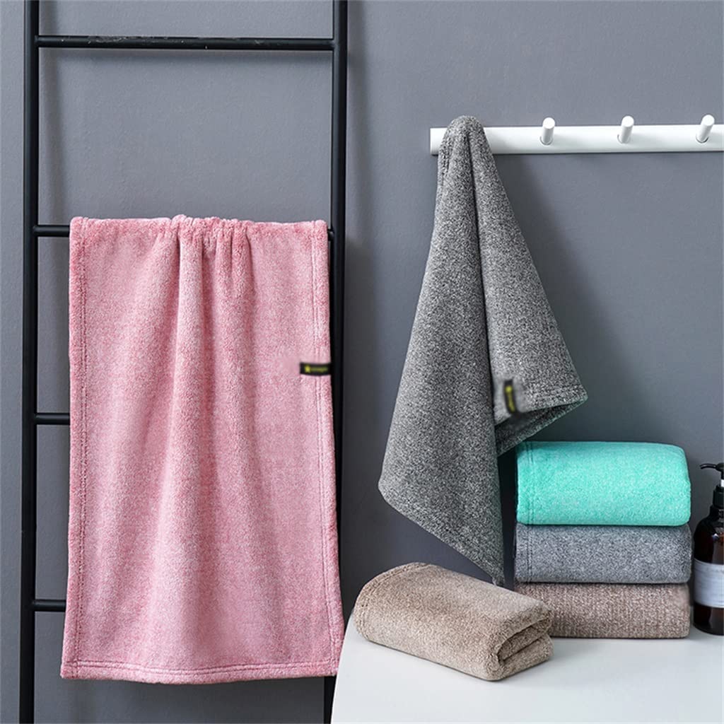Il piccolo asciugamano in cotone lava un viso con l'acqua di aspirazione domestica e asciuga i capelli amanti non è facile far cadere i capelli for fare il bagno