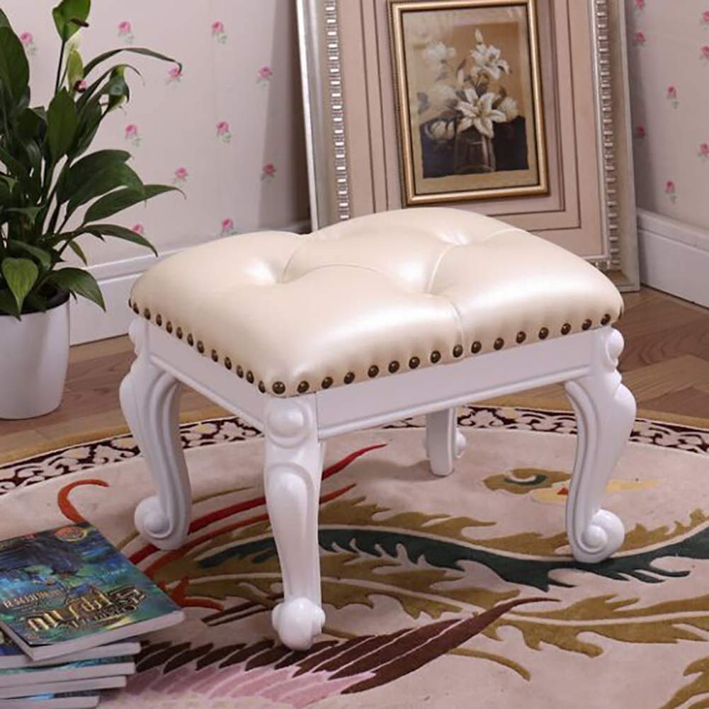 Petit repose-pieds rembourré avec rangement et pouf ottoman cuir