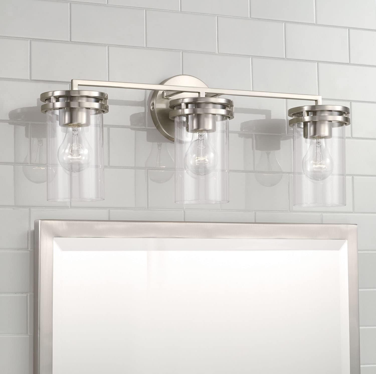 HomePlace by Capital Lighting 148731BN-539 Fuller Transitional Clear Glass Cylinder Vanity Light for Bathroom, 3-Light 300 Total Watts, 10" H x 24" W, Brushed/Satin Nickel