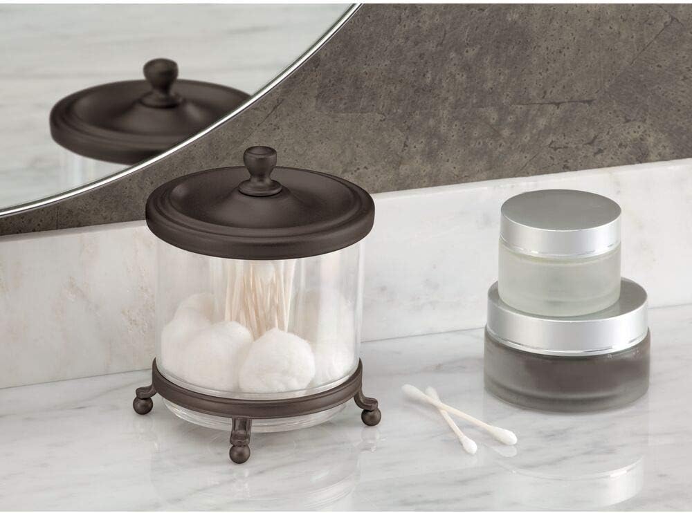 mDesign Round Bathroom Vanity Countertop Divided Storage Canister Plastic Jar with Metal Lid for Cotton Swabs, Rounds, Balls, Makeup Sponges, Blenders, Bath Salts - Clear/Bronze
