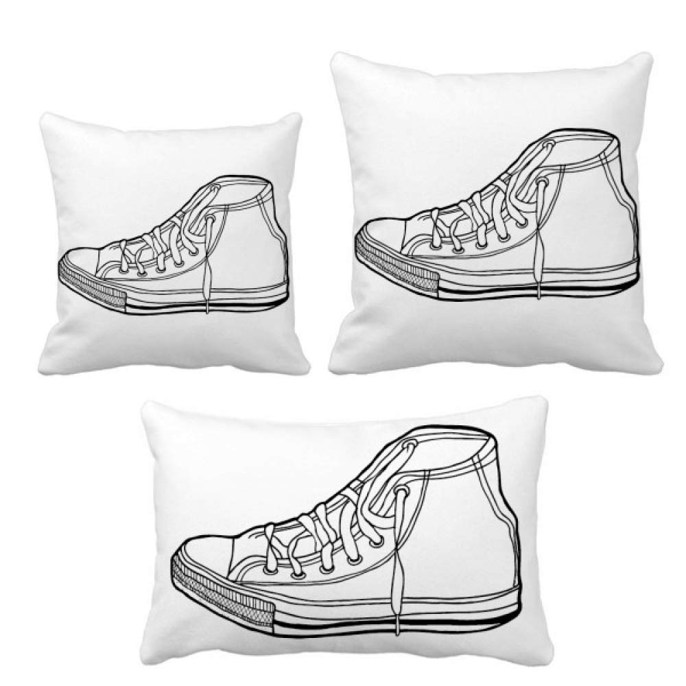 Housse de coussin en toile blanche pour canapé afin de créer un salon cosy et artistique