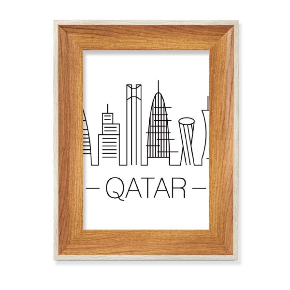 Cadre photo bois Qatar pour organiser un affichage de tableau sur table