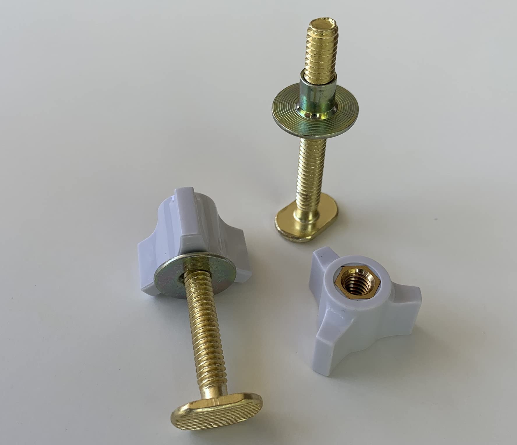 One Pair of White Hard ABS Porcelain 2.25 inch Toilet Bolt Tri-Head Screws For Top Mount Toilet Seat Hinges or Floor to Toilet Bolts.