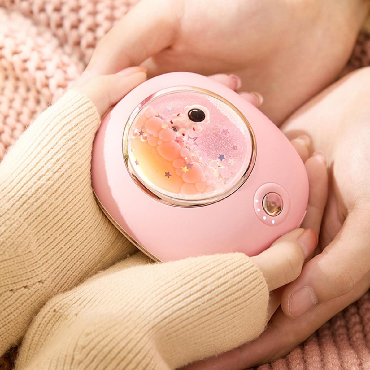 Wiederaufladbarer Handwärmer im Weltraum Design mit Cartoon Motiv Rosa